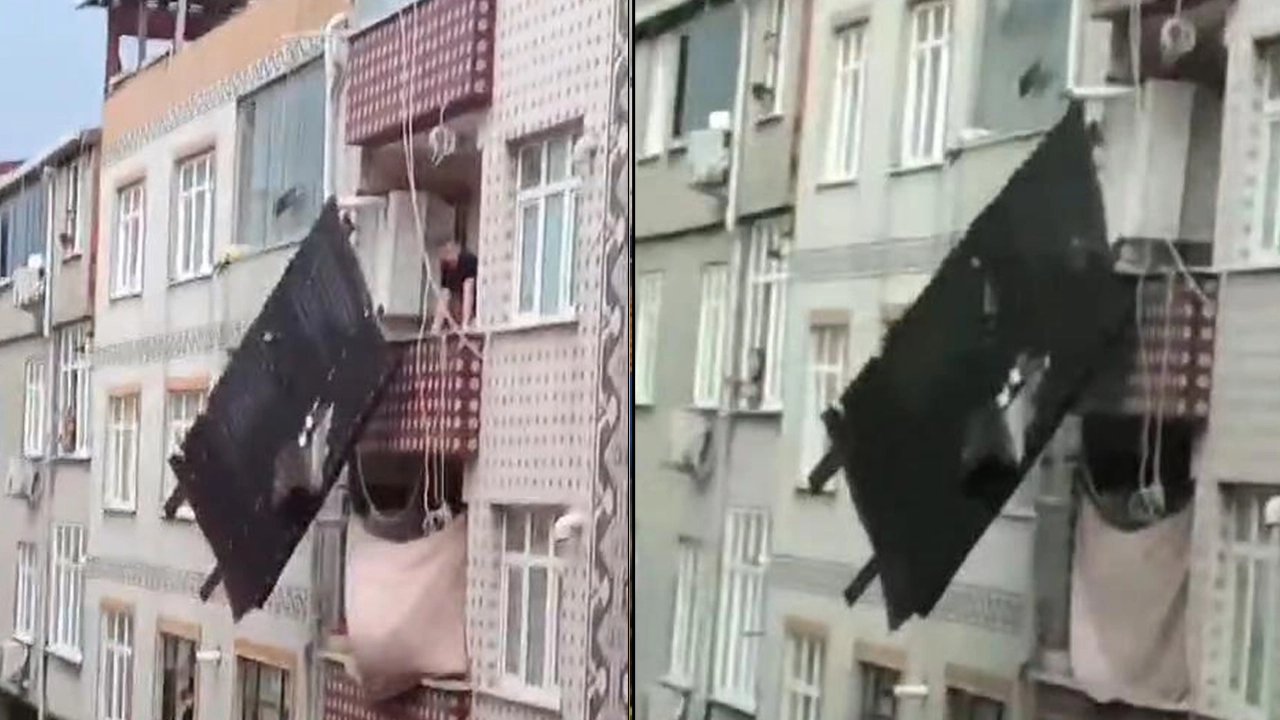 Çatıdan kopan parça balkondaki çamaşır ipine asılı kaldı