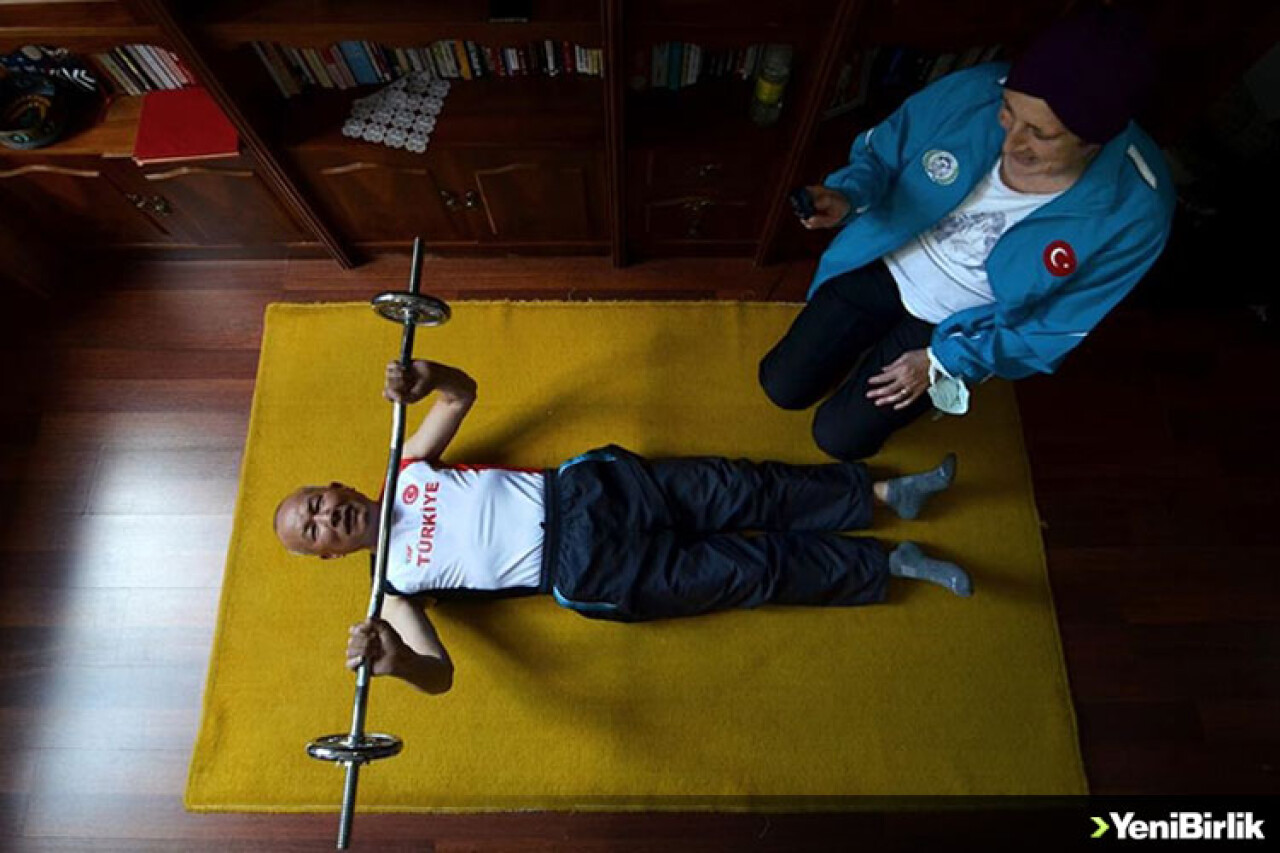 'Rekortmen dede' gücünü antrenörlüğünü de yapan eşinden alıyor