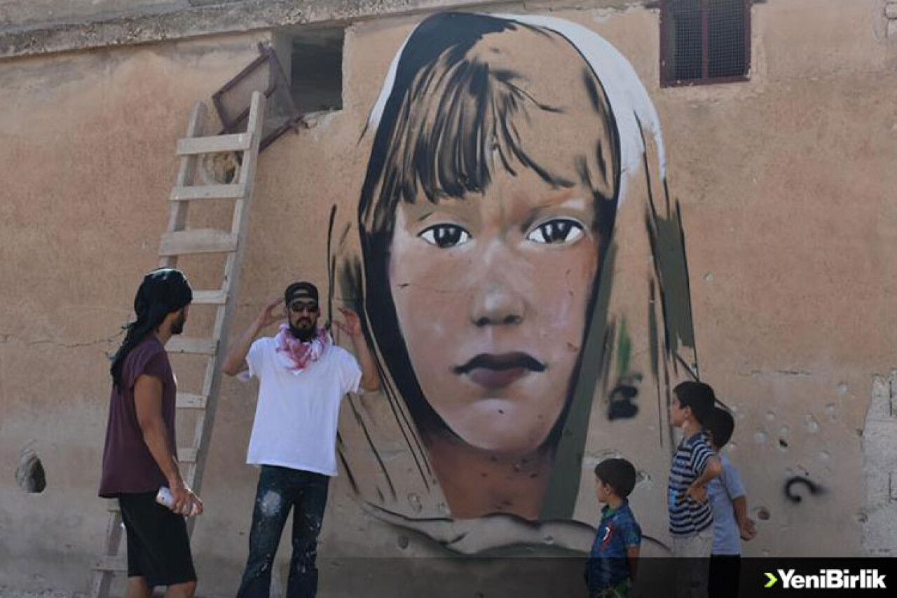 Türk grafiti sanatçılarından Suriye'de anlamlı çizimler
