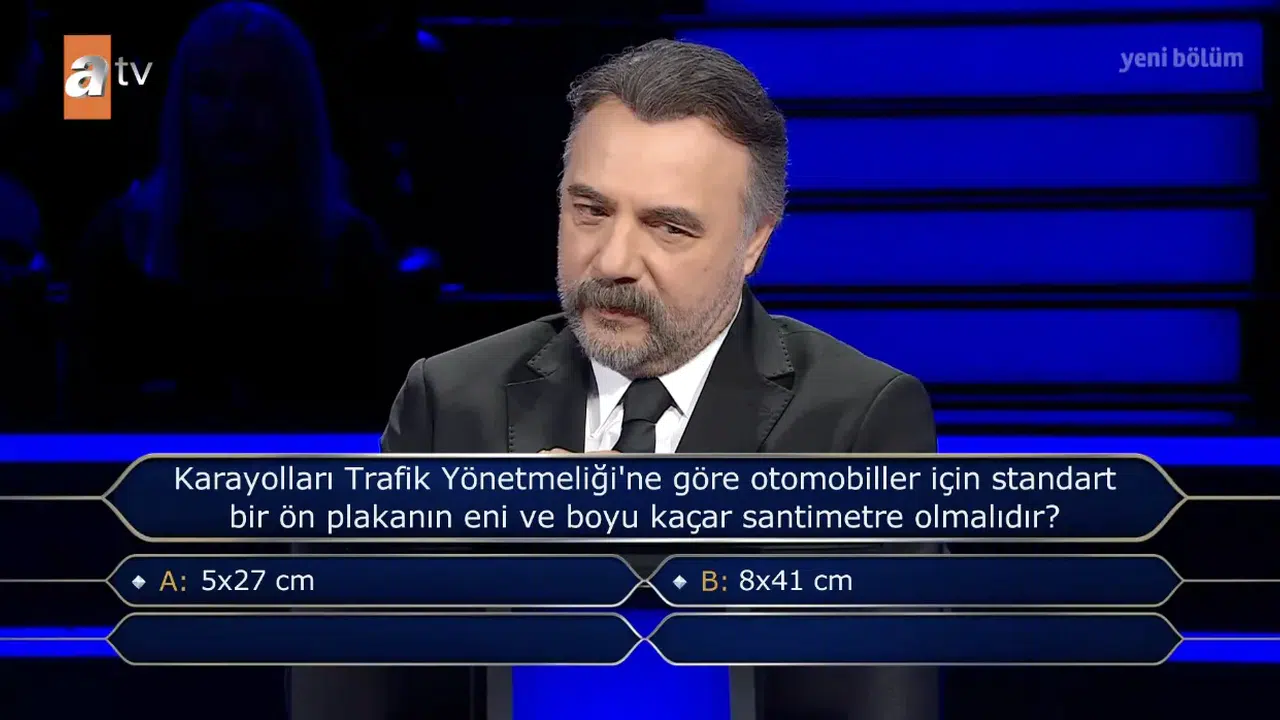 Karayolları Trafik Yönetmeliğine göre, otomobiller için standart bir ön plakanın eni ve boyu kaç santimetre olmalıdır?