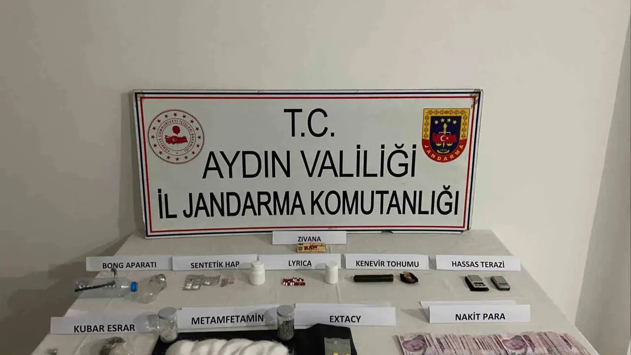 Germencik'te zehir tacirlerine şafak operasyonu: Adreslerden cephanelik çıktı