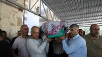 Hatay'daki tren kazasında hayatını kaybeden anne toprağa verildi