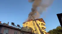 Uşak'ta 6 katlı apartmanın çatısında yangın paniği