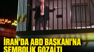 Tahran meydanında dikkat çeken gösteri: Trump kılığına giren oyuncu sembolik parmaklıklar ardında