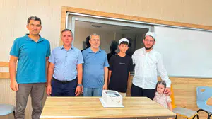 Burhaniye'de imam hatip ortaokulu kur'an kursu ilk hafızını yetiştirdi