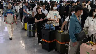 Japonya'da tarihi yağış felakete dönüştü: Havalimanında binlerce kişi mahsur