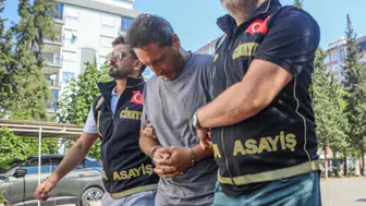 Antalya Havalimanı'nda sevgilisini öldüren emekli polis adliyede