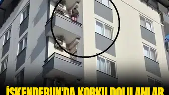 İskenderun'da korku dolu anlar: Balkon duvarına tırmanan kadını itfaiye kurtardı