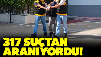 Adana'da 317 suçtan aranan siber dolandırıcı cephanelik gibi evde yakalandı