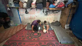 İsrail bombası tutkusunu engelleyemedi: Bacağını yitiren Salih sahada kalıyor
