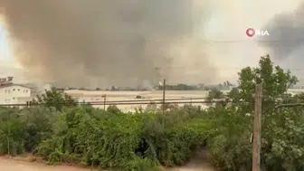 Seydikemer'deki yangın havayı kararttı, müdahaleler hız kesmeden devam ediyor