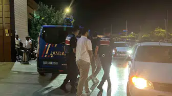 Vize dolandırıcılığı operasyonunda tutuklular gazetecilere tepki gösterdi