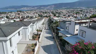 Didim Belediyesi akbük'te sürdürülen parke taşı döşeme çalışmalarıyla alanlar düzenleniyor