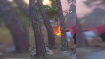 Kemer'de çıkan orman yangınına havadan ve karadan müdahale sürüyor