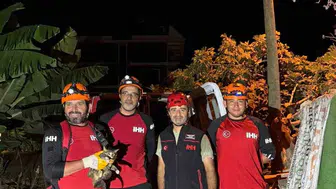 Alanya'da mahsur kalan kedi arama kurtarma ekipleri tarafından kurtarıldı