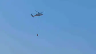 Muğla'daki orman yangınına hava ve kara destek: 15 helikopter, 7 uçak müdahale ediyor