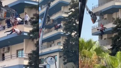 Korku dolu anlar: Sepeti kırılan vinçten düşen işçiler havada asılı kaldı