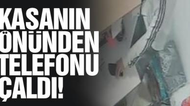 Kasa önünden telefonunu çaldılar!