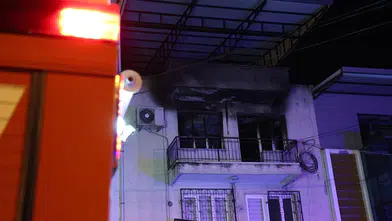 İzmir’de yangın faciası! Kendi canını engelli oğluna siper etti