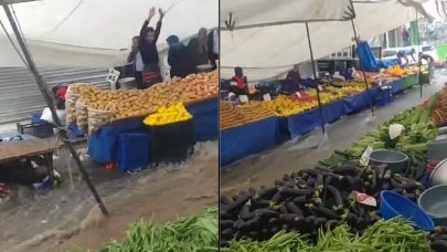 Sağanak yağış pazar yerini vurdu, yollar göle döndü