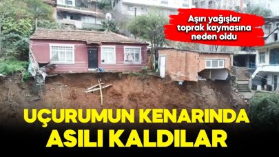 İlçede toprak kayması: Uçurumun kenarında asılı kaldılar