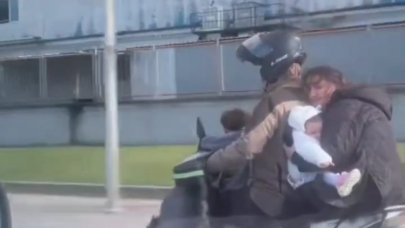 Motosiklet üzerinde 4 kişilik tehlikeli yolculuk!