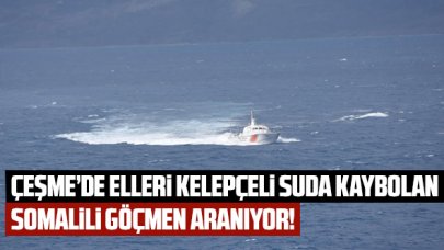 Çeşme'de elleri kelepçeli Somalili göçmen suda aranıyor
