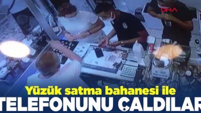 Yüzük satma bahanesi ile telefonunu çaldılar