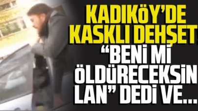 Motosiklet sürücüsü otomobildeki sürücüye kaskla saldırdı!