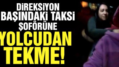 Direksiyon başındaki taksiciye yolcu tekmesi