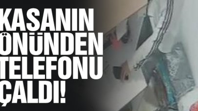 Kasa önünden telefonunu çaldılar!
