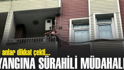 Avcılar'da binanın tutuşan plastik kaplamasına sürahiyle su dökerek müdahale