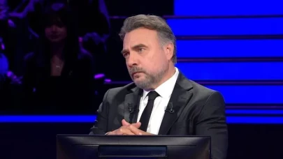 Alice Harikalar Diyarında Alice’in büyümesine sebep olan ve sihirli bir yiyecek olan kekin üzerinde ne yazıyordu?