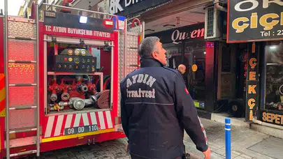 Efeler’de elektrik arızası çiçekçiyi ateşe verdi: İtfaiye son anda yetişti!