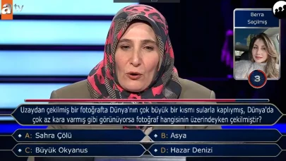 Uzaydan çekilmiş bir fotoğrafta Dünya'nın çok büyük bir kısmı sularla kaplıymış, Dünya'da çok az kara varmış gibi görünüyorsa fotoğraf hangisinin üzerindeyken çekilmiştir?