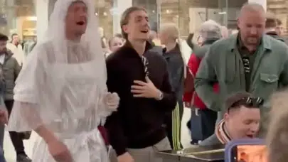 Joe Worrall’dan olay görüntü: Gelinlikle havalimanını salladı