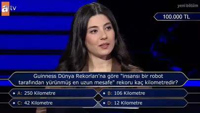 Guinness Dünya Rekorları'na göre 'insansı bir robot tarafından yürünmüş en uzun mesafe' rekoru kaç kilometredir?