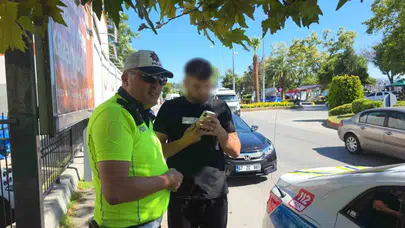 Karadeniz Ereğli'de trafik polisi dolandırıcıların hedefindeki vatandaşı kurtardı