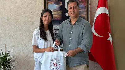Bir sezonda 9 Türkiye derecesi alan Belinay Gündoğdu ödüllendirildi
