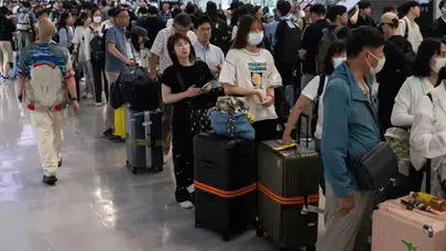 Japonya'da tarihi yağış felakete dönüştü: Havalimanında binlerce kişi mahsur