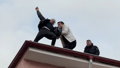 Çatıdan düşmek üzereyken son anda emniyet müdürü kurtardı
