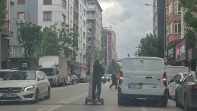 Eskişehir trafiğinde pes dedirten anlar: Scooter üzerinde tehlikeli yolculuk