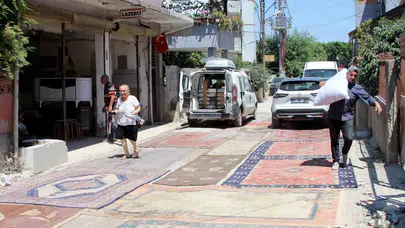 Adana'da tozla imtihan: Sokakları halıyla kapladılar
