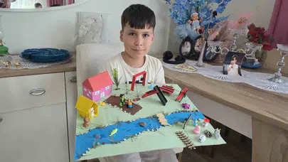Kütahya’da minik ellerden büyük hayaller: 8 yaşındaki Göktuğ’un köyü herkesi büyüledi