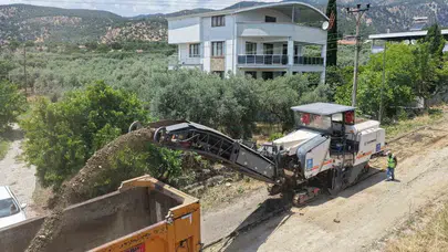 Kuyucak’ta ulaşım konforu artıyor: İki mahalle arasındaki yol baştan aşağı yenileniyor