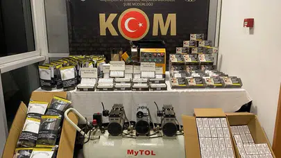 Kütahya emniyetinden kaçakçılara çifte darbe: Ev ve iş yerleri kıskaca alındı