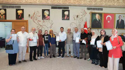 Yıllardır süren bekleyiş mutlu sonla bitti: Aksu’da 12 aile tapusuna kavuştu