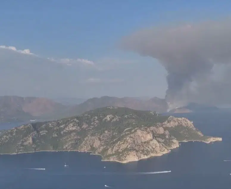 Marmaris’te zamana karşı yarış! Sarp kayalıklardaki alevlere zorlu müdahale
